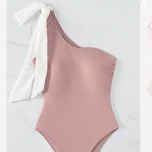 CUPSHE Pink one piece with White Textured Bow that is adjustable